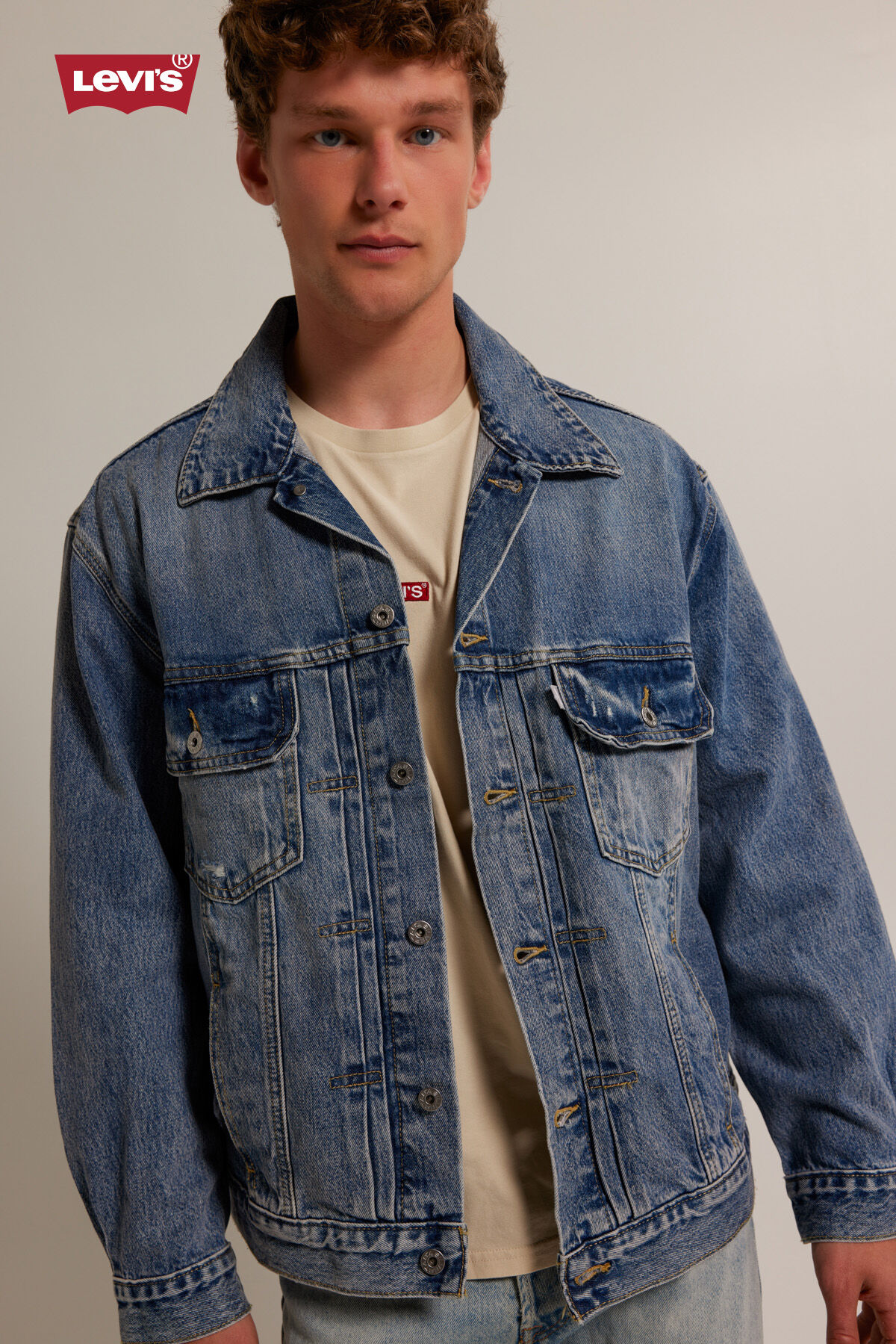 Levi's blue trucker jacket top