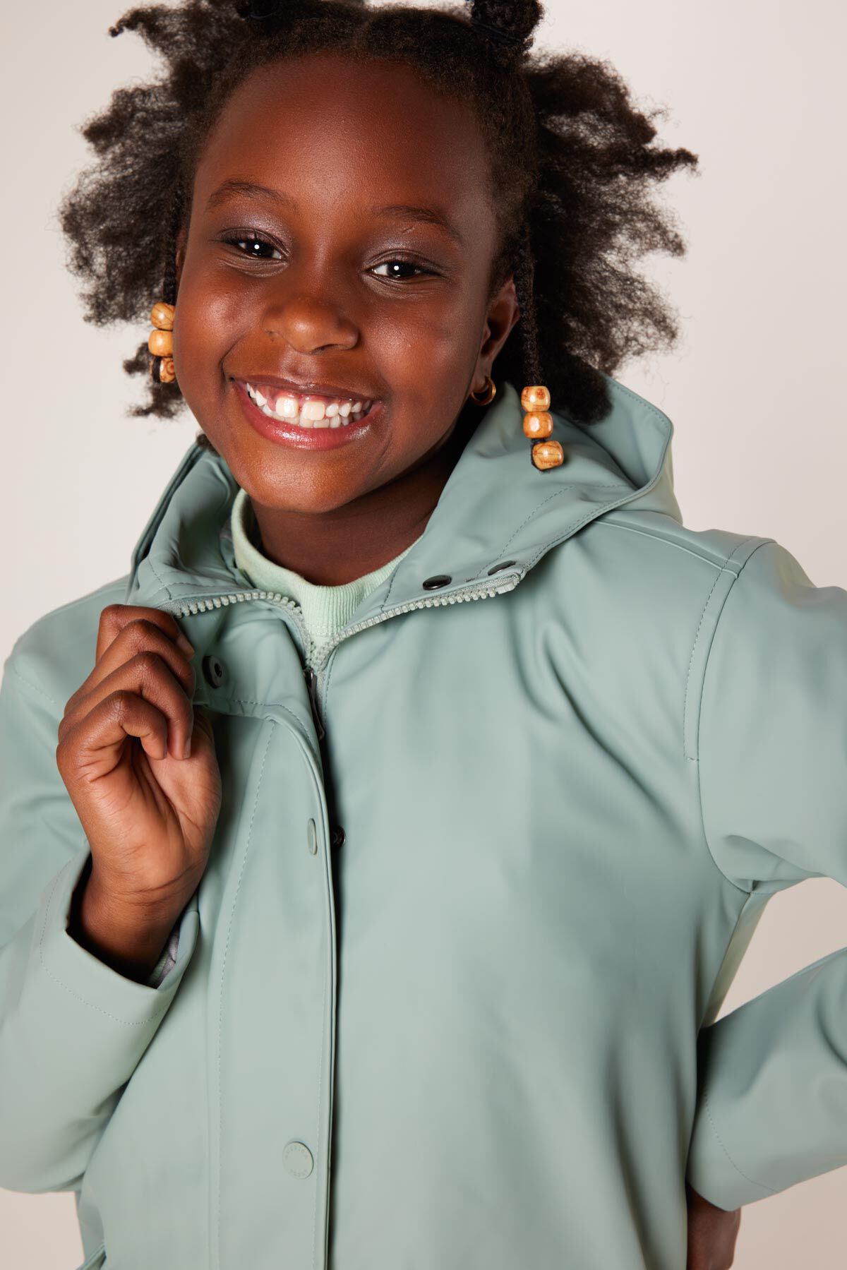 Girls green raincoat shop
