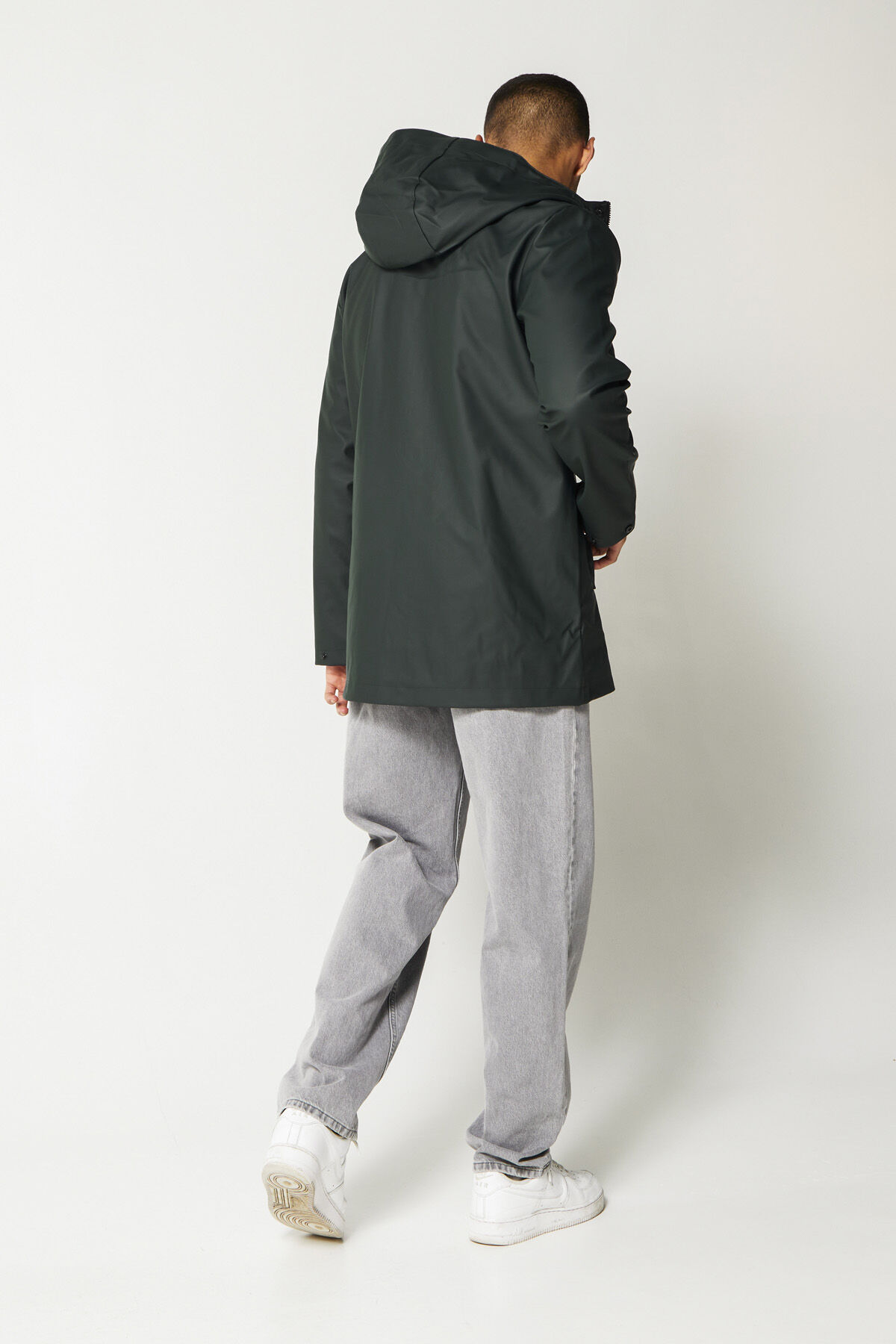 Dark green store rain jacket